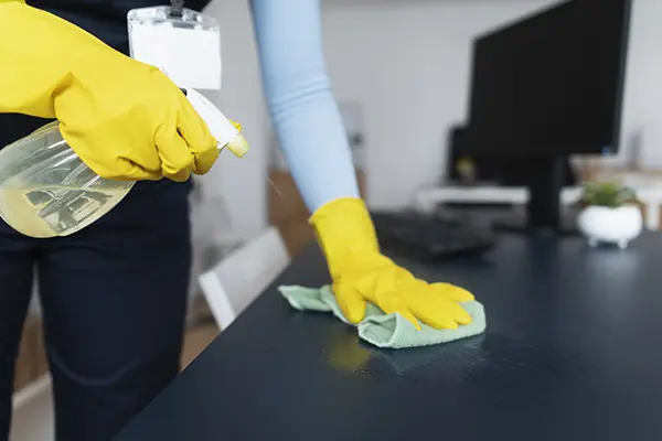 Person cleaning an office